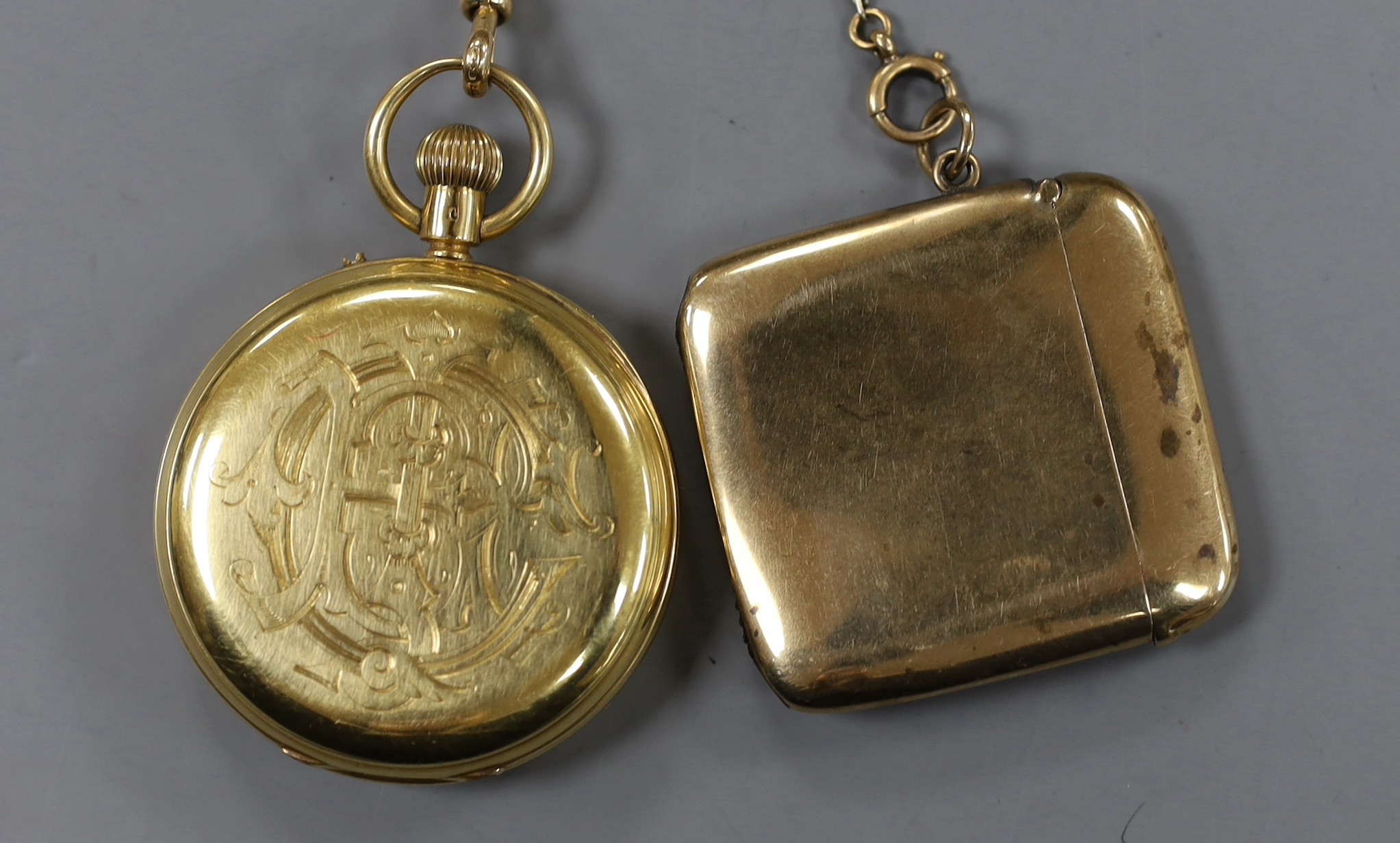 An 18ct gold open faced keyless pocket watch, by R.H. Saxton of Buxton, with Roman dial and engraved monogram to the case back, case diameter 50mm, together with a two colour 18ct albert and a George V 9ct gold vesta cas
